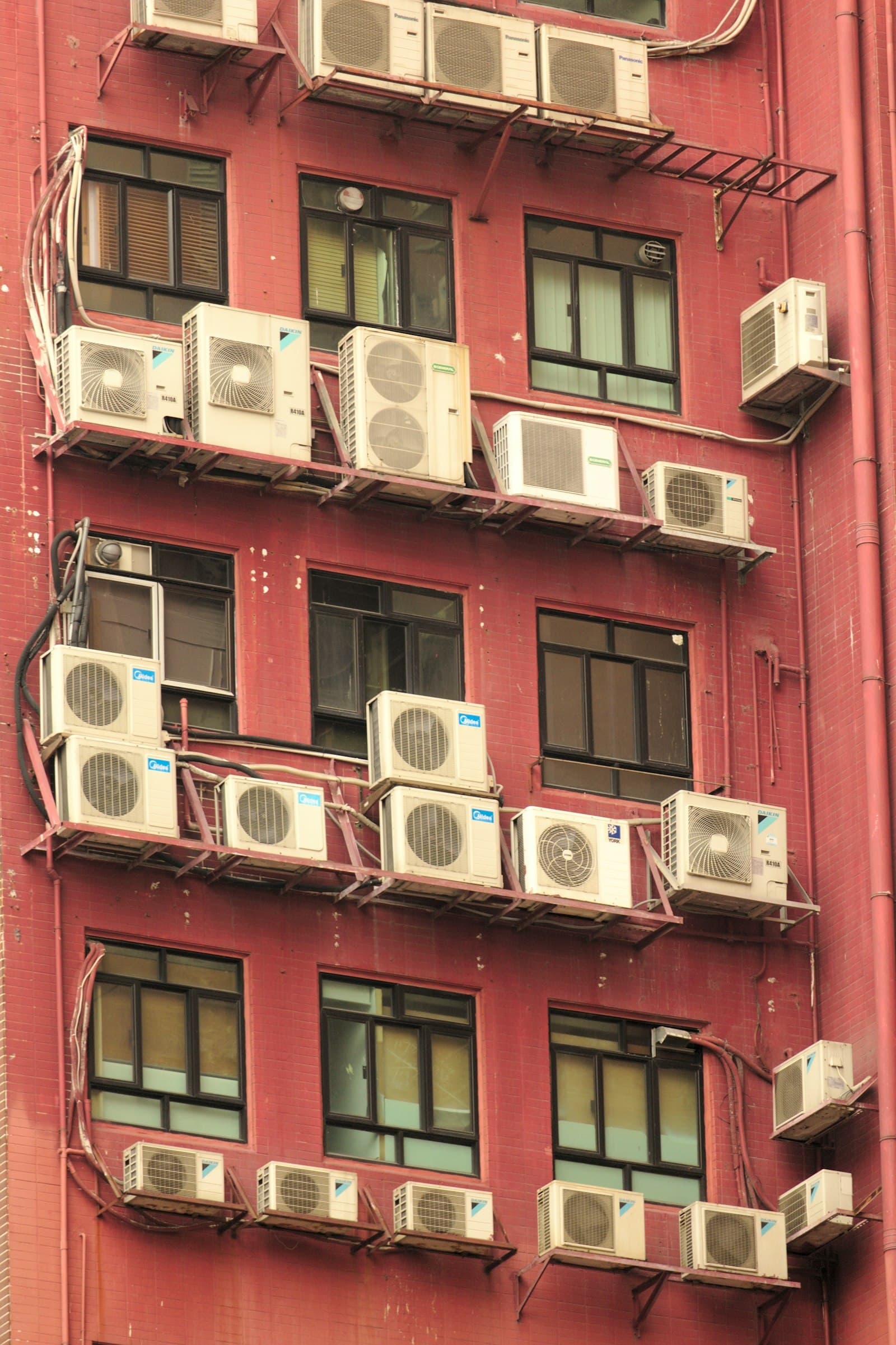 Outdoor air conditioning units across a service area